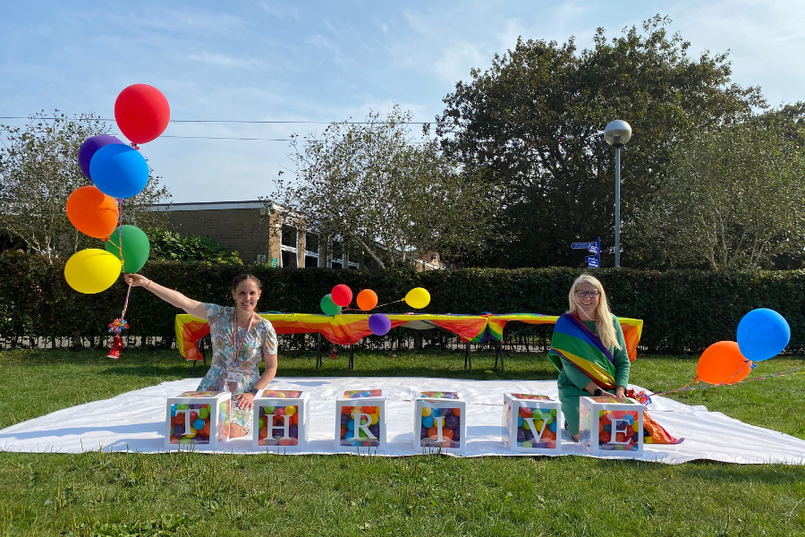 Staff at Red Oak Primary School celebrating their Thrive School of Excellence award